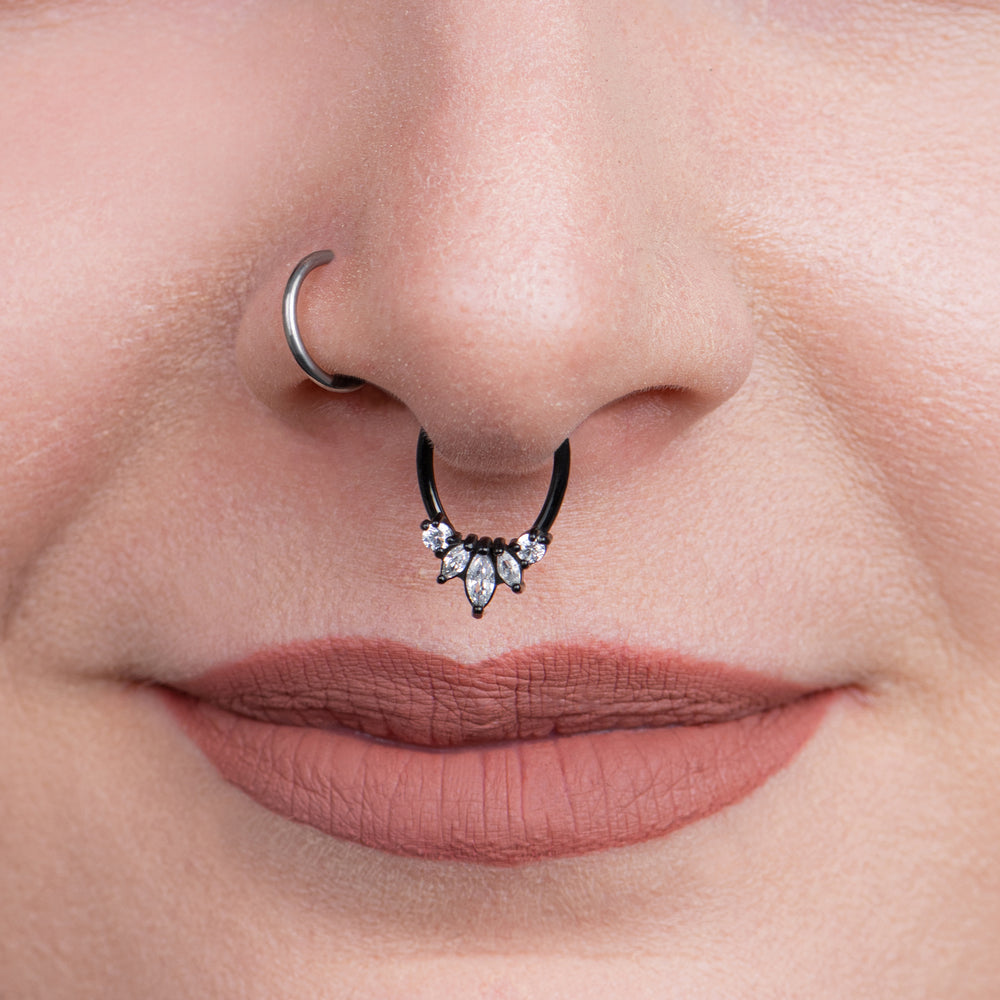 Hinged clearance septum clicker